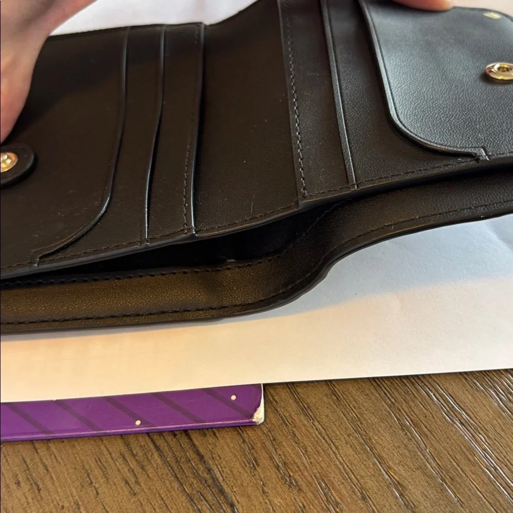Kate Spade New York black and silver staci saffiano leather wallet purse